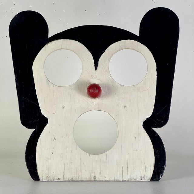 A vintage and primitively home made and hand painted Mickey style ball toss game board. And we love that red nose. Today...