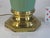 A Hollywood Regency Style Table Lamp. It is a vintage piece and is of a medium size, with an electric power cord source....
