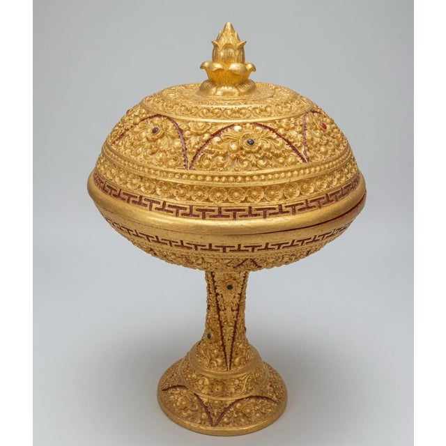 This Antique Hsun-Ok Burmese Offering Vessel is a stunning piece of Southeast Asian antique craftsmanship, standing at 33...