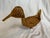 Quirky wicker basket in shape of duck/loon on the water. Great for kids room or lake house. Some damage to wicker bear...