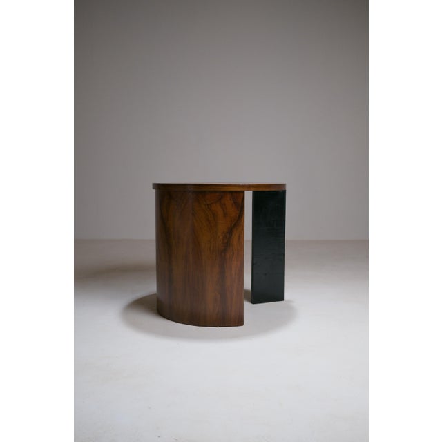 This distinctive side table, produced in Europe around 1930, belongs to the reduced geometric vocabulary of interwar...