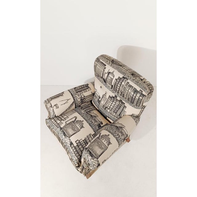 We offer for sale a retro armchair inspired by the English style reupholstered between the 90s and early 2000s with a...