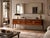 This elegant Italian sideboard or chest of drawers with matching mirror, by La Permanente Mobili Cantù, reflects the...