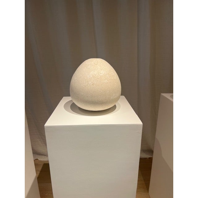 Kando by Michael Verheyden in Marble Pietra Di Vicenza is carved from a single piece of stone, showcasing soft, natural...
