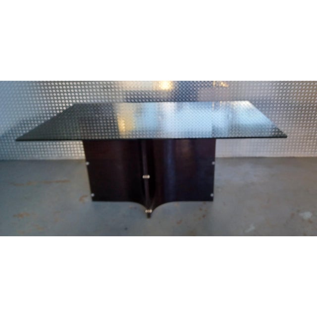 Vintage Mid-Century Modern smoked glass table with curved black lucite base. In the manner of Charles Hollis Jones. Can be...