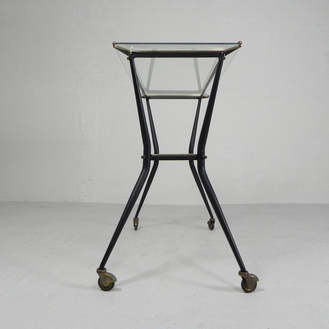 Height: 75 cm. Width: 90 cm. Depth: 50 cm. Glass plate dimensions: 38 x 83 cm. Origin: Italy, 1950s. Material: steel /...