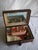 This beautiful box present an elegant decor of mother of peal on the top and laiton marqueterie , the inside is like a...