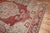 An antique Turkish rug from the early 20th century in a room-size format. Measures: 7'7'' x 11'6''.