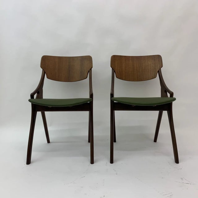 Material: wood designer: arne hovmand olsen origin: denmark conditon: good one of the chairs has a repair on the sticks...