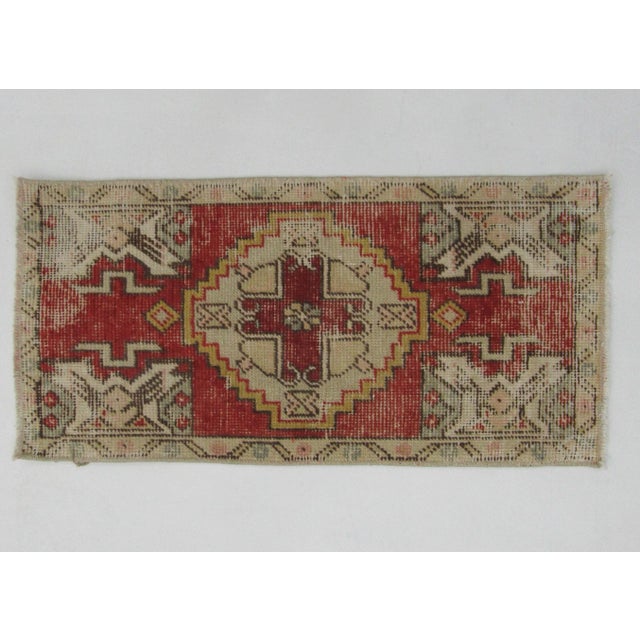 Vintage handknotted decorative mini rug from Konya region of Turkey. Approximately 50-60 years old. In very good condition.