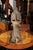 A pair of life size Italian carved wooden parrot sculptures from the late 19th century, mounted on modern steel bases....