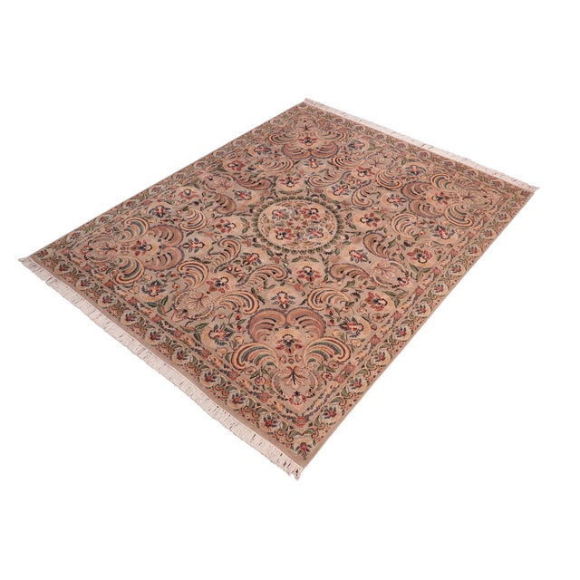Designed with mesmerizing intricacy and gorgeous color palette, this hand-knotted masterpiece demonstrates the beauty and...