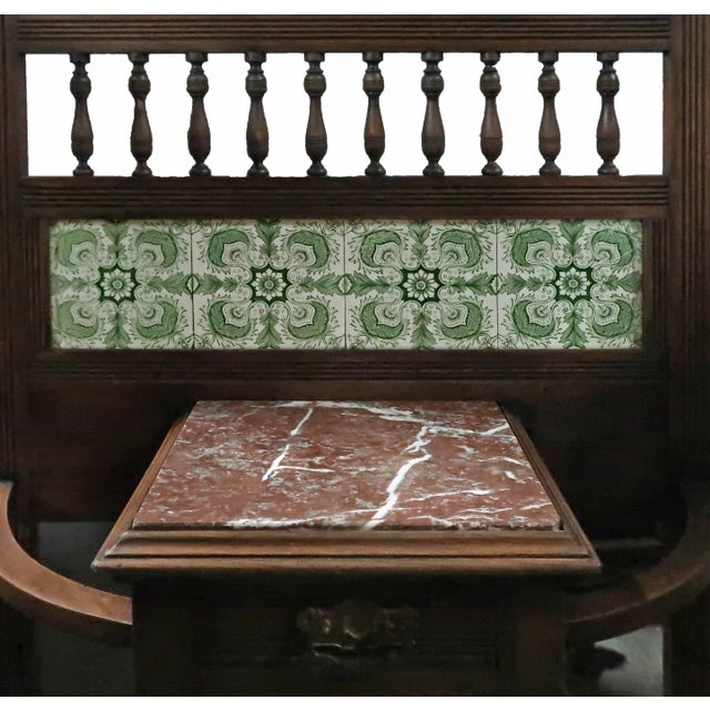 Antique tall hall stand. This lovely antique piece has a semi-circular frame at the front which integrates a lower shelf...