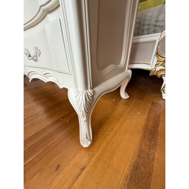 Transform your bedroom into a sanctuary of classic elegance with this breathtaking French Provincial triple dresser....
