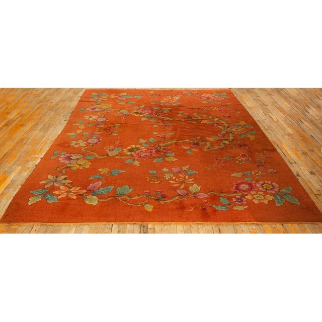 An alluring near-square Antique Chinese Art Deco carpet, circa 1920. This 8' 10" x 8' 11" piece is defined by its warm,...