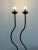 Base W21 Height 67.5 Artisanal floor lamps featuring hand-forged iron frames with a distinct undulating silhouette. The...