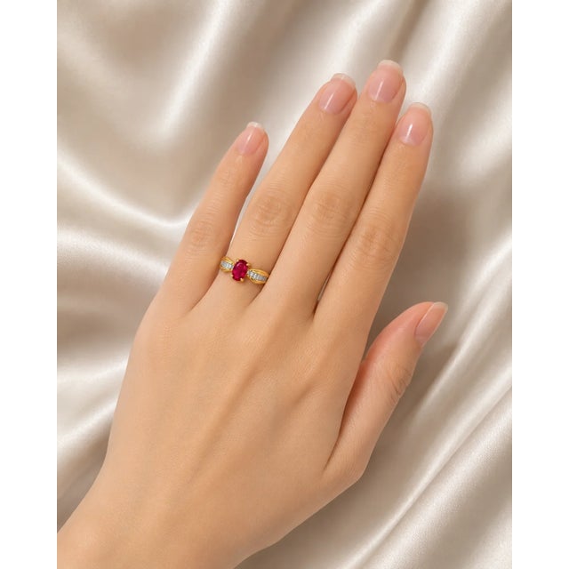 This exquisite 14K Yellow Gold Ruby and Diamond Ring is the perfect blend of luxury and elegance. Designed to make a...