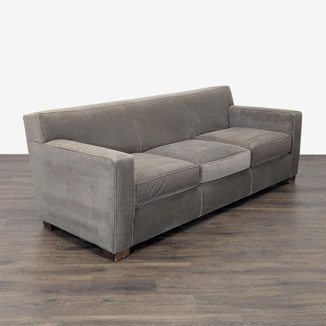 This Room & Board 3-seat sofa features a simple, modern design with clean lines and a sturdy build. The sofa is...