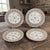 This set of 4 vintage Saxonia Dresden painted floral gilded reticulated 8'' plates is a charming addition to any table...