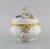 Meissen porcelain lidded tureen with hand-painted flowers and gold edge. Lid modelled with flowers and foliage. 1920s....