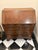 An antique English Georgian style oak secretary bureau (or slant-front desk) with deep amber-brown patina, a fall-front...