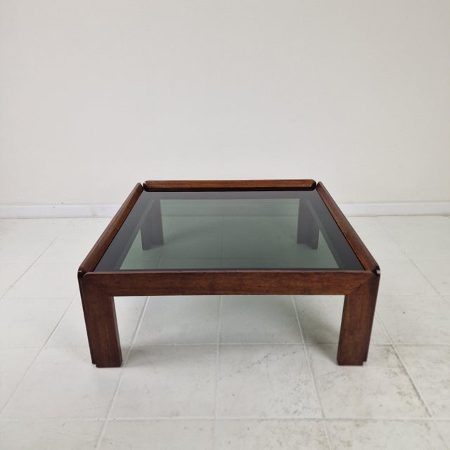 An icon of Italian modernism, this square coffee table was designed by the renowned duo Afra & Tobia Scarpa and produced...
