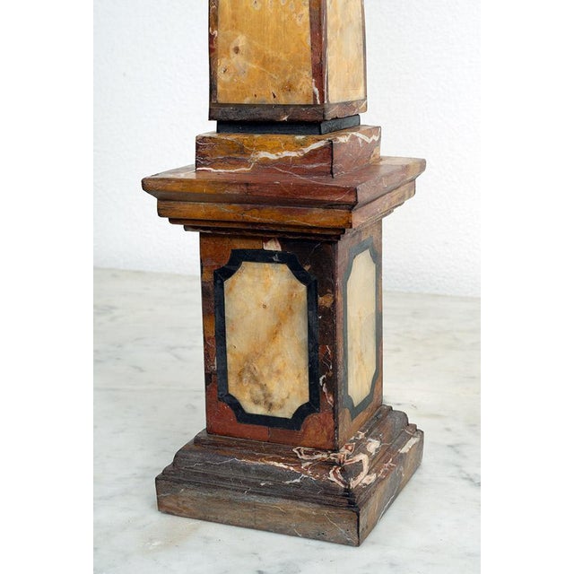 Pair of antique obelisks in polychrome marble from Florence, dating back to the second half of the 19th century. The base...