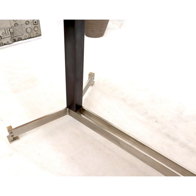 Elongated oval shape dark walnut Knoll, Herman Miller match dining conference table.