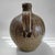 This item is a hand-thrown stoneware jug handcrafted by master potter Rodney Leftwich of Western North Carolina. It has a...
