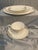 This elegant five-piece Wedgwood bone china dinner set is perfect for any occasion. The gold print design on the round...