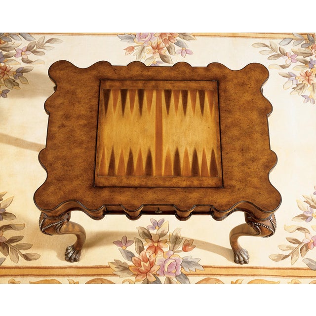 Selected solids and choice veneers. Hand carved details. Reversible game board with chess on one side and backgammon on...