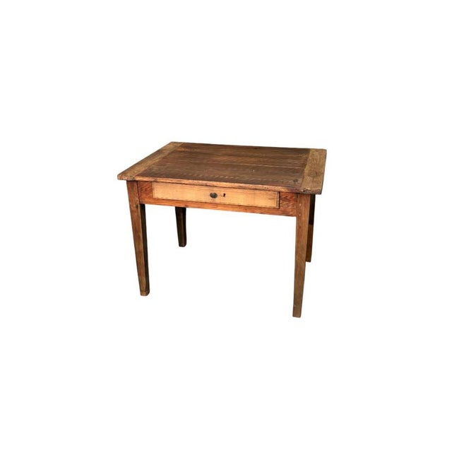 A table made of larch wood with elegant walnut headboards and a practical central drawer. Solid and functional, it...