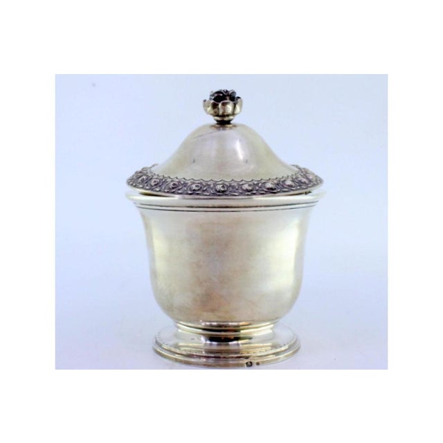 Silver Candy Box with Lid and Handle Embossed with Floral Motifs and Engraved Waves, in Very Good conditions. Designed...