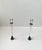 A spir of vintage Danish postmodern style candlestick holders in string metal. Adjustable in height up to 28 cm. They are...