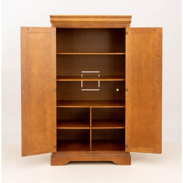Modern Cherrywood Two-Door Wardrobe, opening to four shelves above two-open compartments. 74.25" H x 39.75" W x 21.25" D....