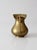 Vintage brass pitcher with a graceful bulbous form, twisted handle, and scalloped rim. Dating to the mid-20th century,...