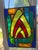 Vintage leaded stained glass window panel with a striking geometric design reminiscent of the Art Deco period. Deep cobalt...