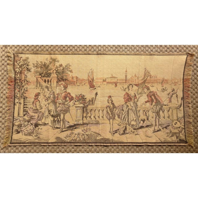 A charming Italian tapestry, woven in the mid 1900's. The Victorian-style textile depicts a canal scene in Venice with...