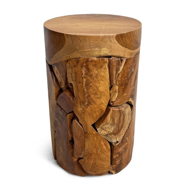 Organic modern design round drum side table crafted from freeform teak fragments pieced together harmoniously. Each table...