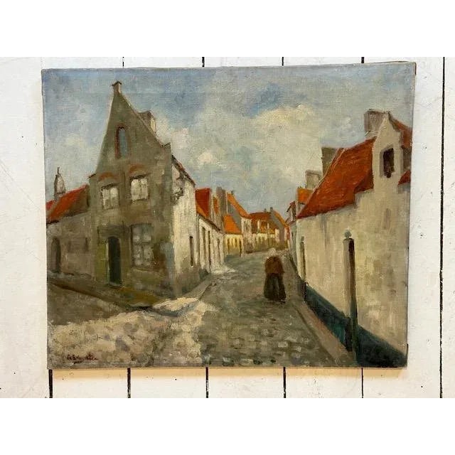 Blue Skies Street Scene In Amsterdam Village Of A Woman Walking In The Shadow Of Buildings Circa 1900's