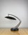 The fase boomerang 64 is an iconic mid-century modern table lamp that exemplifies spanish industrial design at its finest....