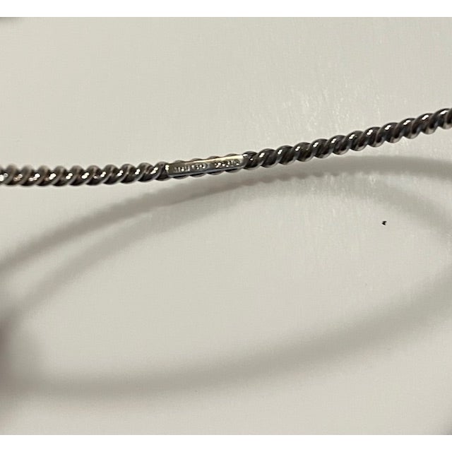 A timeless Tiffany & Co. sterling silver twisted rope cable bangle, discontinued, elegantly crafted — brand new/never worn...