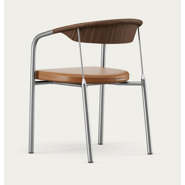 Henrik tengler chairman wood types: walnut, upholstery: cognac for one collection the chairman was designed by henrik...