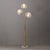 1990s Bloom 3-Light Floor Lamp - Weathered Brass, White Marble Base For Sale - Image 4 of 18