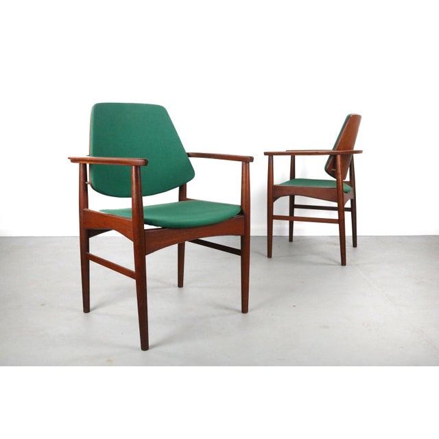 Exceptional set of chairs designed by Arne Hovmand-Olsen. The set of chairs is constructed int teak with a gorgeous wrap...