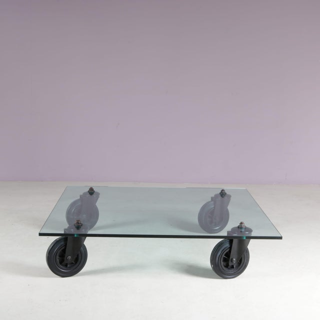 A unique coffee table, designed by Gae Aulenti and manufactured by Fontana Arte in Italy around 1980. This eye-catching...