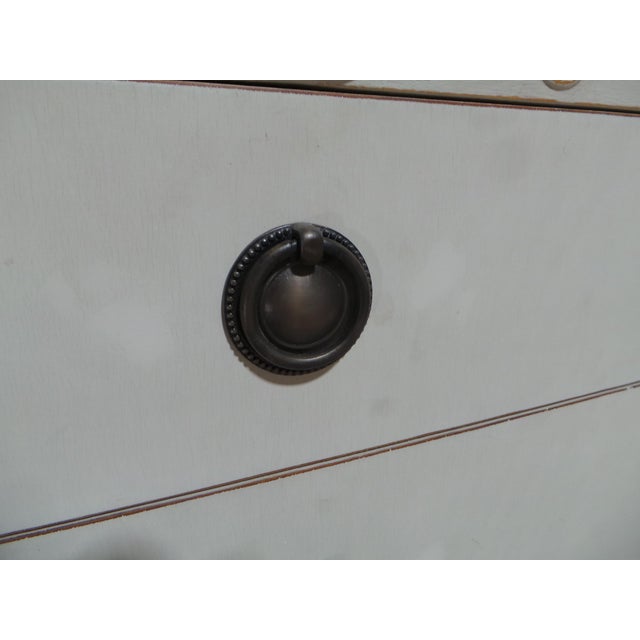 This is a Verry Unique Gustavian Style 9 Drawer Dresser. its been restored and repainted with Milk Paints "Oyster White"