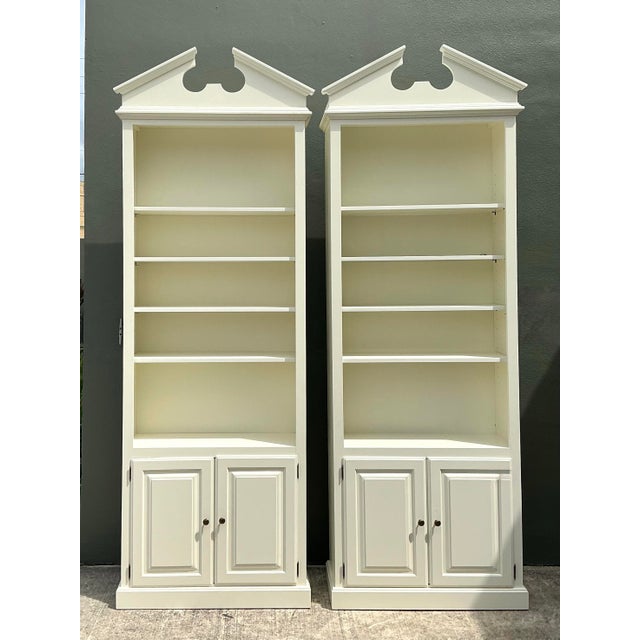 This commanding pair of monumental etageres brings an immediate sense of architectural grandeur to any interior. Defined...