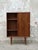 Inspired by Mid-Century Modern design, this stunning Exclusive Multi-Purpose Cabinet features handcrafted walnut wood,...