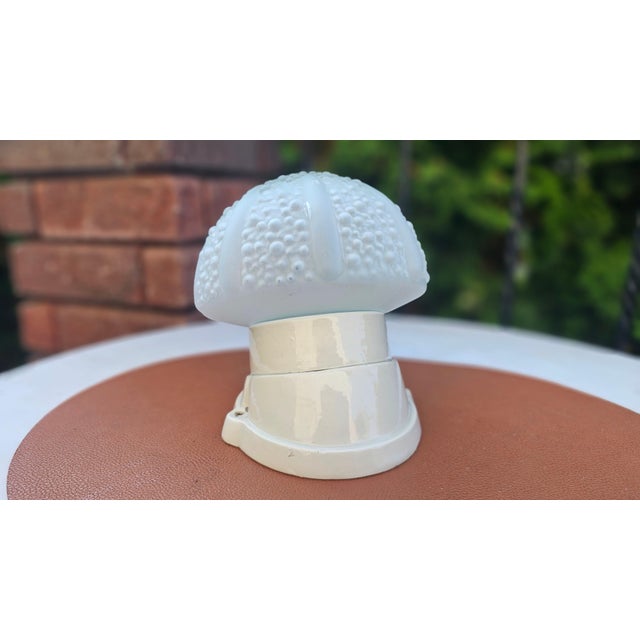 Porcelain wall lamp, Made in Poland, mushroom-shaped shade, 1950s–1970s.Dimensions: height 16.5 cm, depth 17.5 cm; shade...